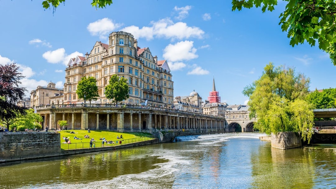 Historic architecture along the River Avon in Bath, England, featured in the Bridgerton Tour.
