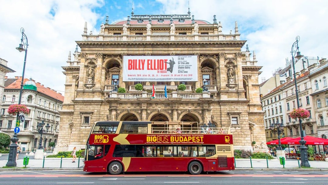 Hop-On Hop-Off bus in front of the Hungarian State Opera, Budapest.