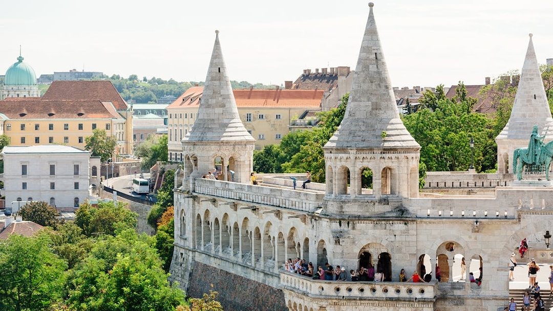 Fisherman's Bastion in Budapest with tourists, seen on a day trip from Vienna.