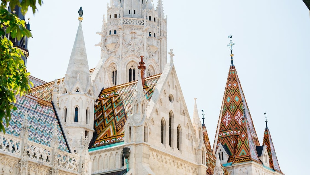 Matthias Church with colorful roof tiles in Budapest, seen on a day trip from Vienna.
