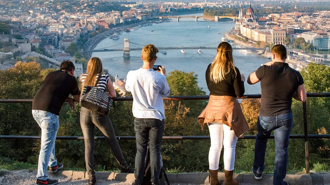 Visitors viewing Erzsébet Bridge and Danube River on Budapest city tour.