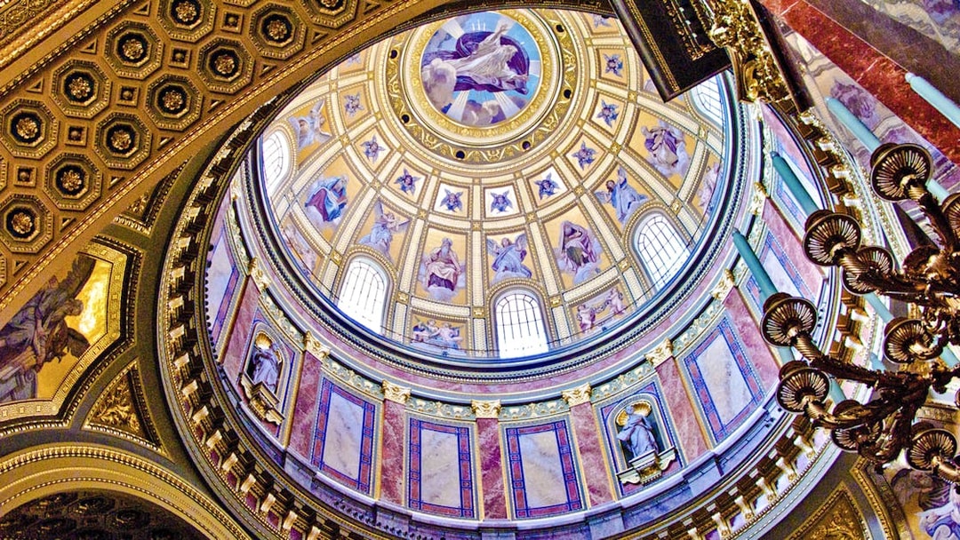 St. Stephen's Basilica interior dome with ornate frescoes and statues, Budapest.