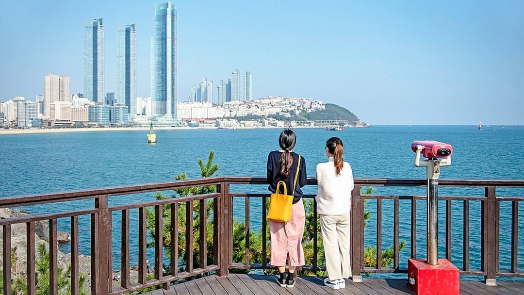 Viewing platform overlooking Haeundae Beach and skyscrapers in Busan, South Korea.