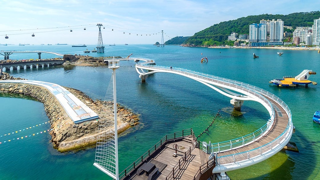 Busan Blueline Park Sky Capsule Tour with ocean view and coastal walkway.