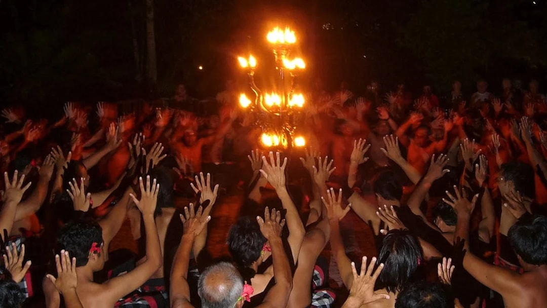 Kecak dancers encircle a fire during the Ubud Kecak & Fire Dance Show in Bali.