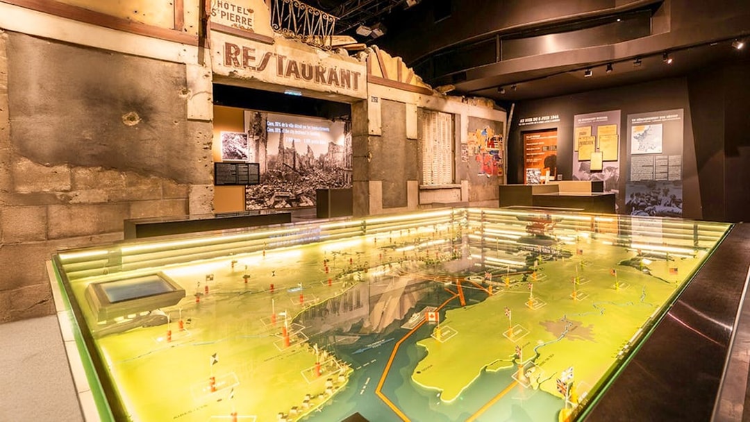 Interactive map display at Caen Memorial Museum showcasing D-Day landings.