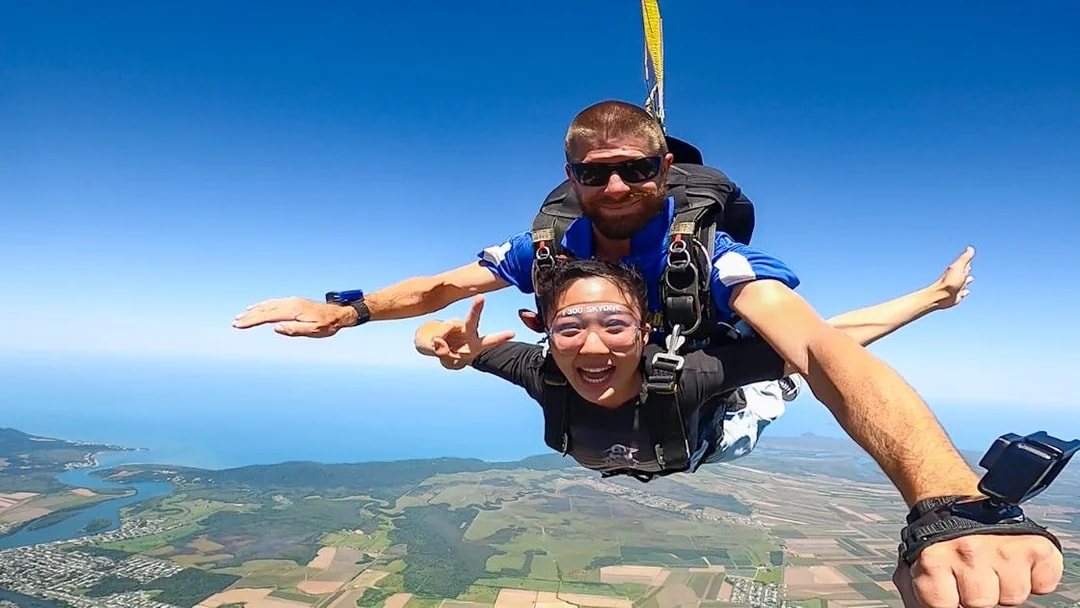 Tandem skydive over Cairns with ocean and landscape views.