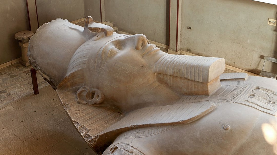 Ramses II statue lying in Memphis, Egypt museum.