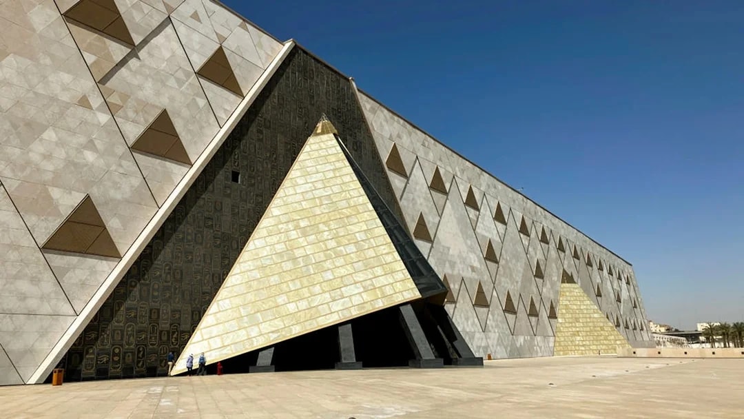 Grand Egyptian Museum exterior with geometric patterns and large entrance.