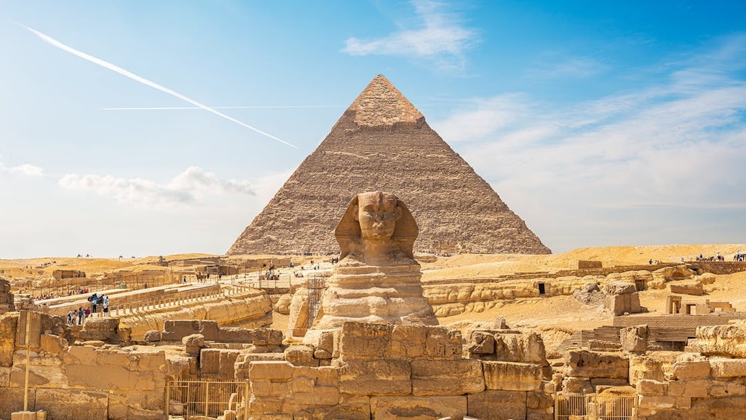 Sphinx and Pyramid of Giza on a sunny day, part of Cairo's private half-day tour.