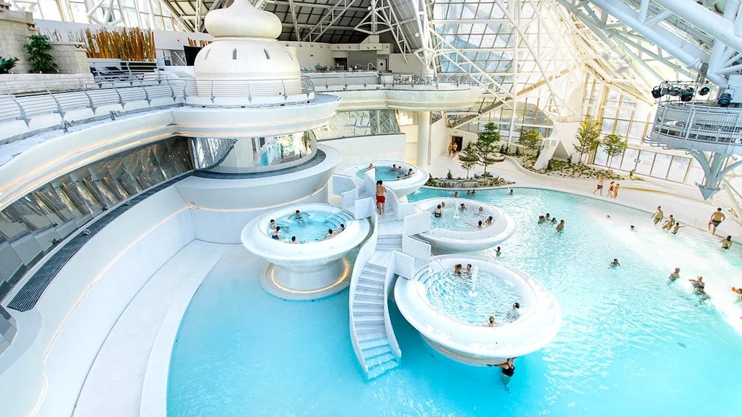 Caldea spa complex in Andorra with thermal pools and modern glass architecture.