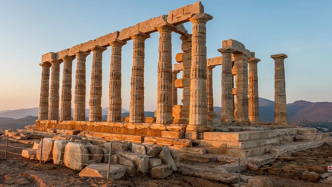 Ruins of Poseidon Temple at Cape Sounion during dawn, Greece.