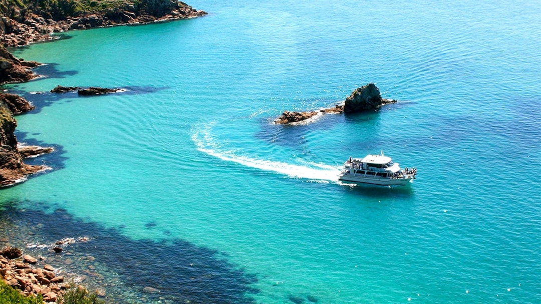 Cruise boat on Cape Woolamai coastline, Phillip Island.