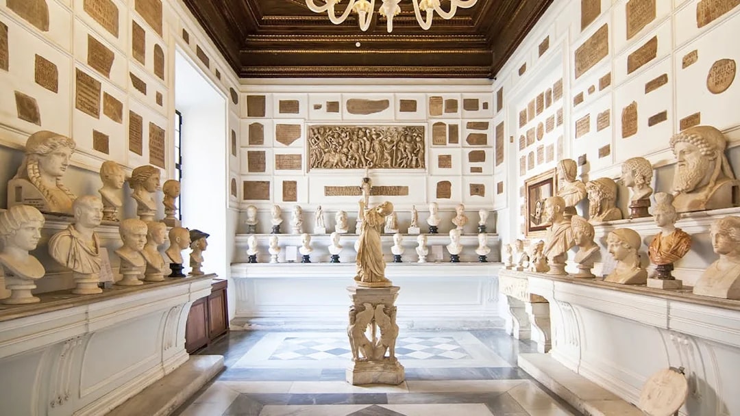 Busts and sculptures in a gallery at Musei Capitolini, Rome.