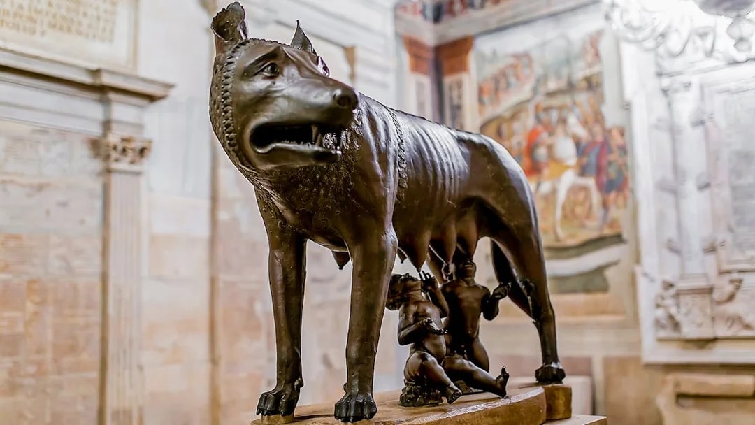 Capitoline She-Wolf statue with Romulus and Remus in Rome museum.