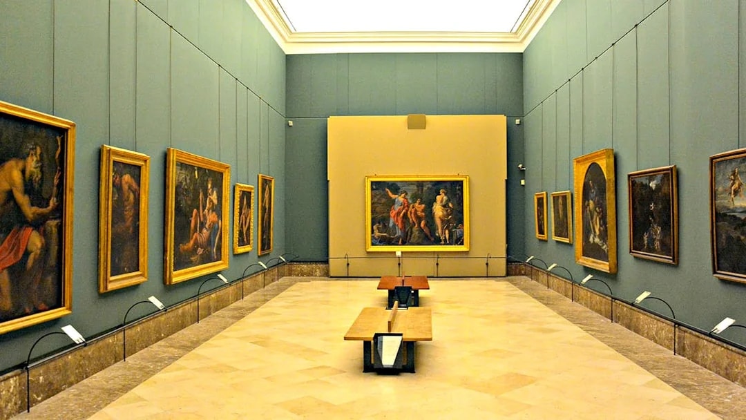 Art gallery with classic paintings on display during Capodimonte small group tour.
