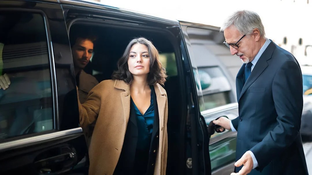 Passenger exiting a shuttle at Cappadocia airport transfer service.