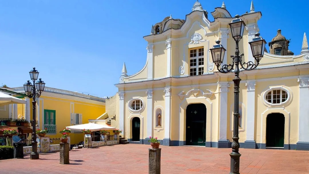 Historic church facade in Capri town square, Italy, part of Capri Island guided tour.