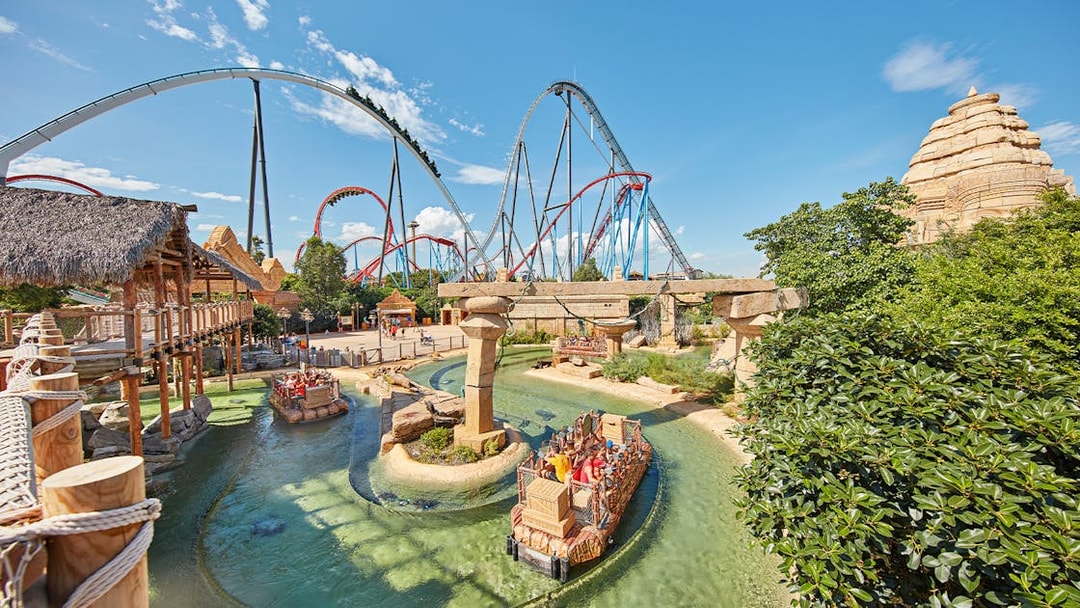 River ride and roller coasters at PortAventura Park, Spain.
