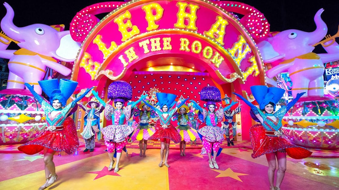 Performers in colorful costumes at Carnival Magic Phuket, Thailand.