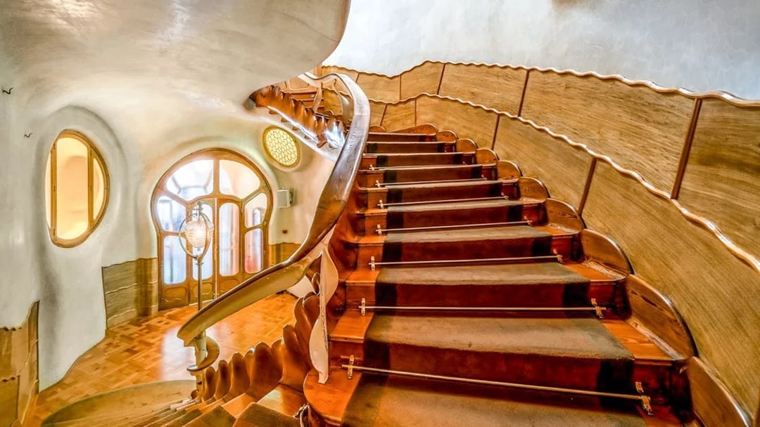 Casa Batlló interior staircase with unique wooden design, Barcelona.