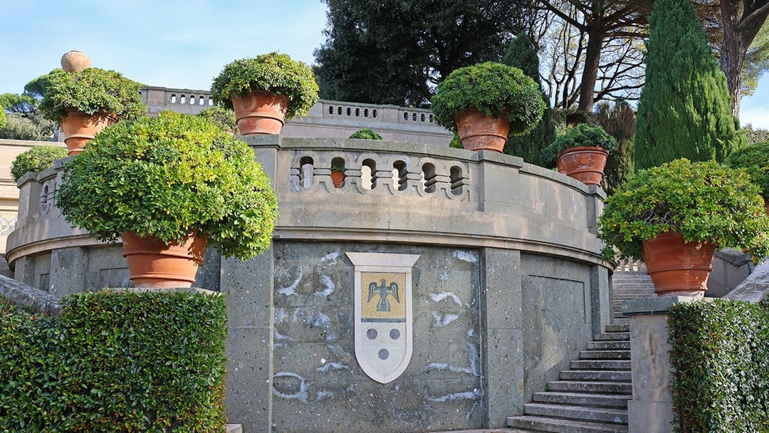 Terracotta pots and greenery in Castel Gandolfo Garden, Italy.