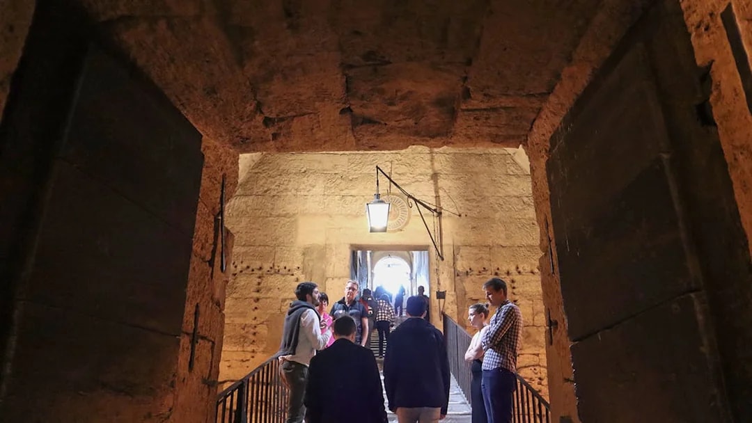 Visitors exploring the interior of Castel Sant'Angelo, Rome.