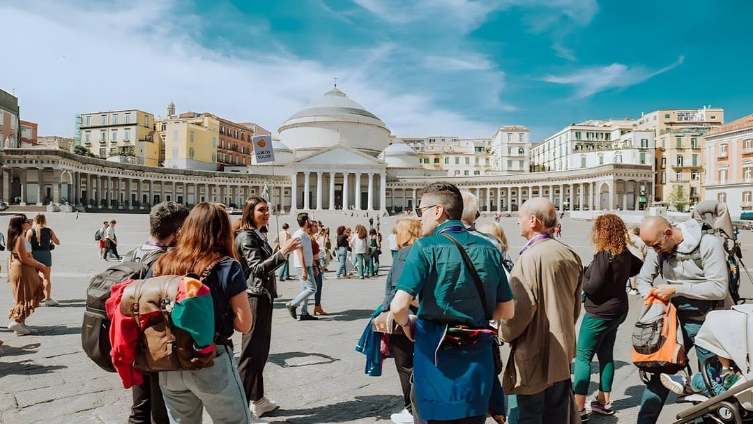 Group tour in Naples at Piazza del Plebiscito, near Castel Sant'Elmo and Certosa di San Martino.