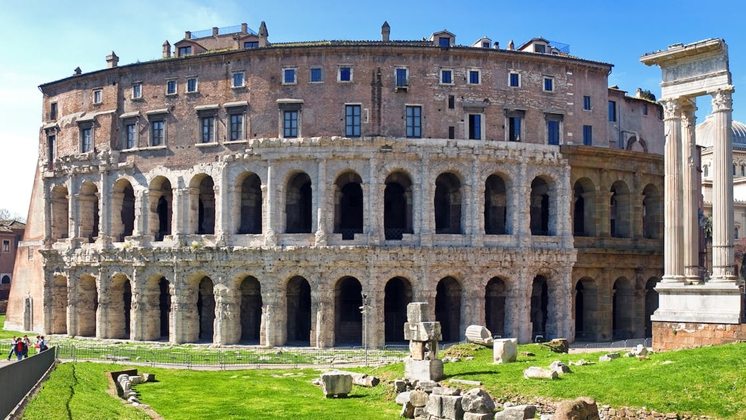 Theatre of Marcellus in Rome with ancient arches and columns.