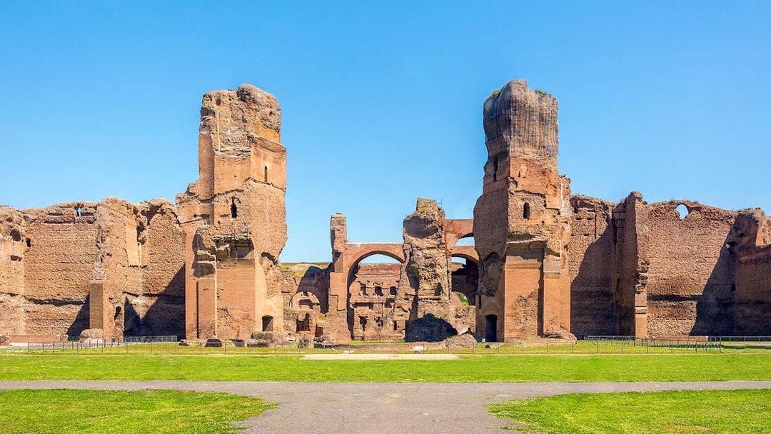Ruins of the Baths of Caracalla in Rome, showcasing ancient Roman architecture.