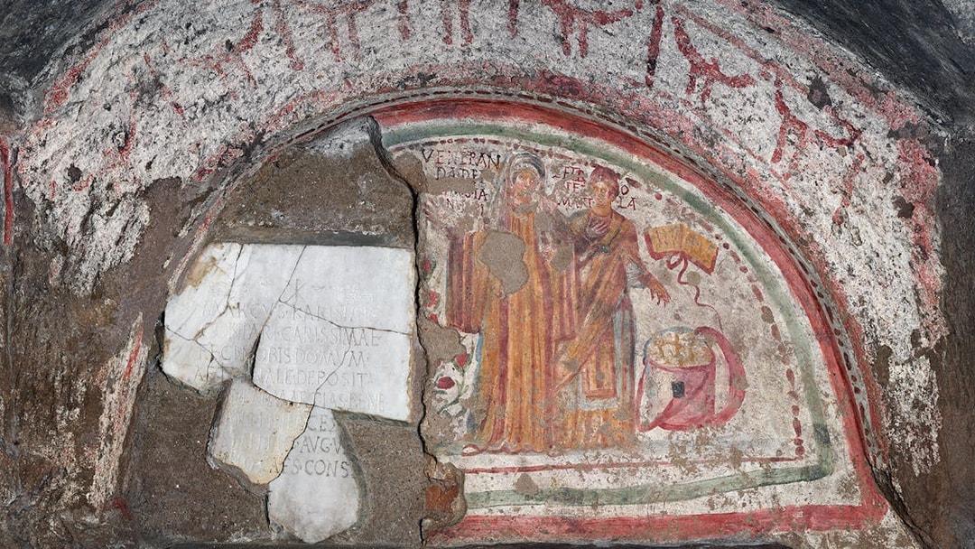 Fresco of The Martyrs in the Catacombs of Domitilla, Rome, depicting two figures with inscriptions.