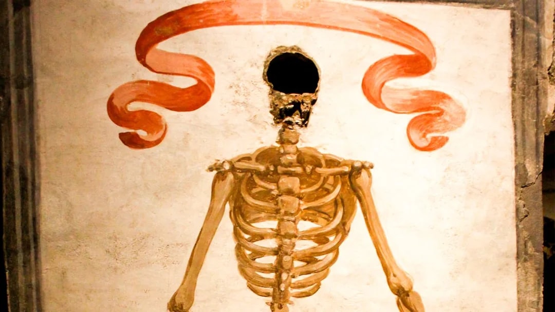 Skeleton mural in Catacombs of San Gaudioso, Naples, Italy.