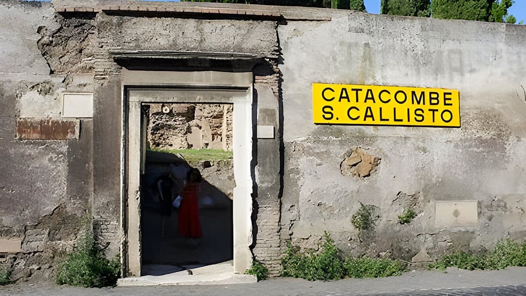 Tourists entering the Catacombs of St. Callixtus in Rome, Italy.