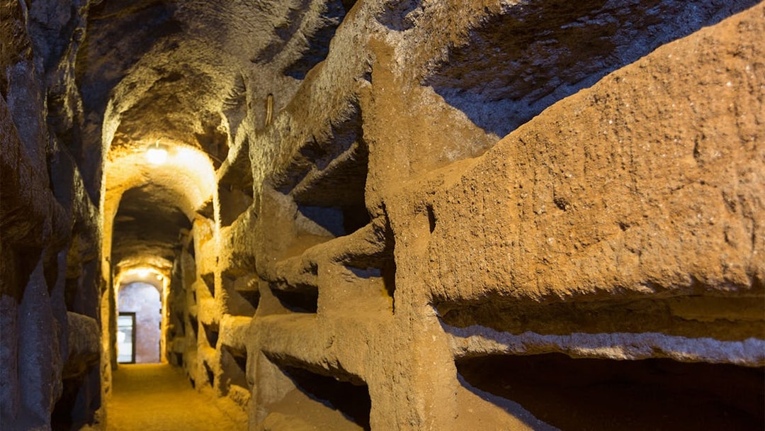 Catacomb passageway with niches on the Appian Way, Italy.