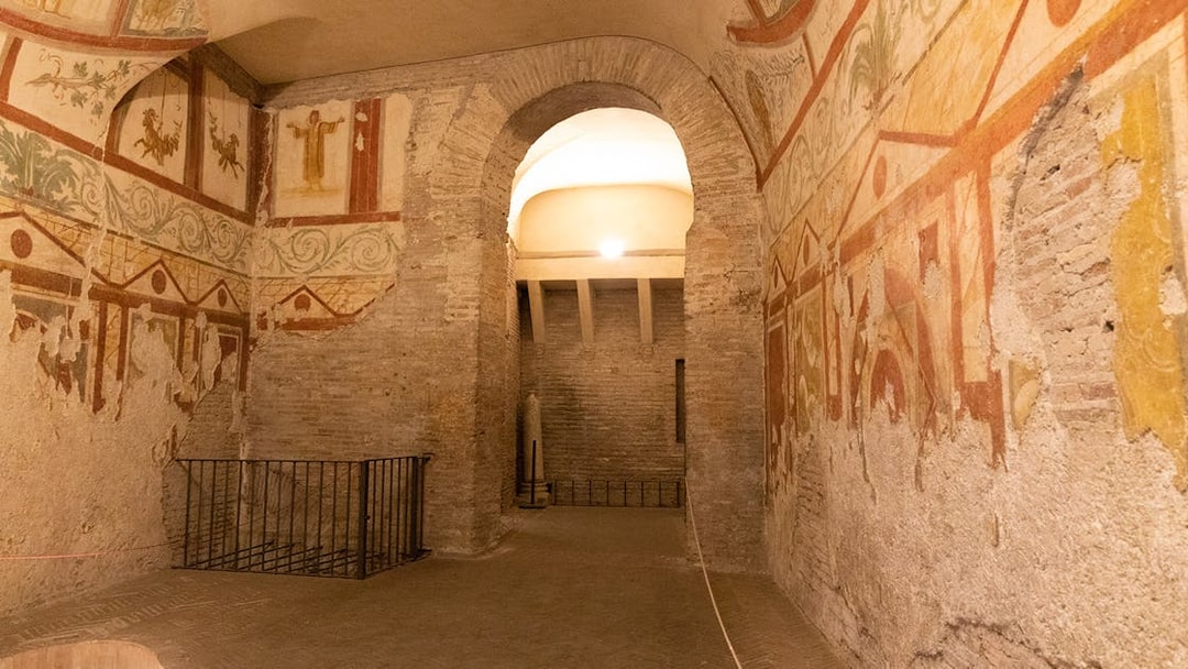 Underground catacombs with ancient frescoes on a guided tour with transfers.