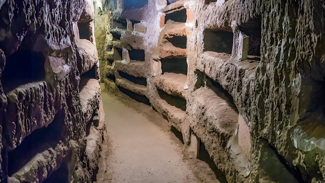 Ancient underground passage in the Catacombs of St. Callixtus, Rome.