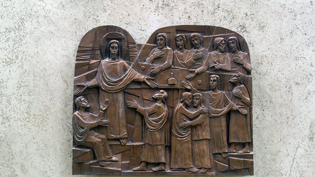 Relief sculpture depicting biblical scene in Catacombs of St. Callixtus, Rome.