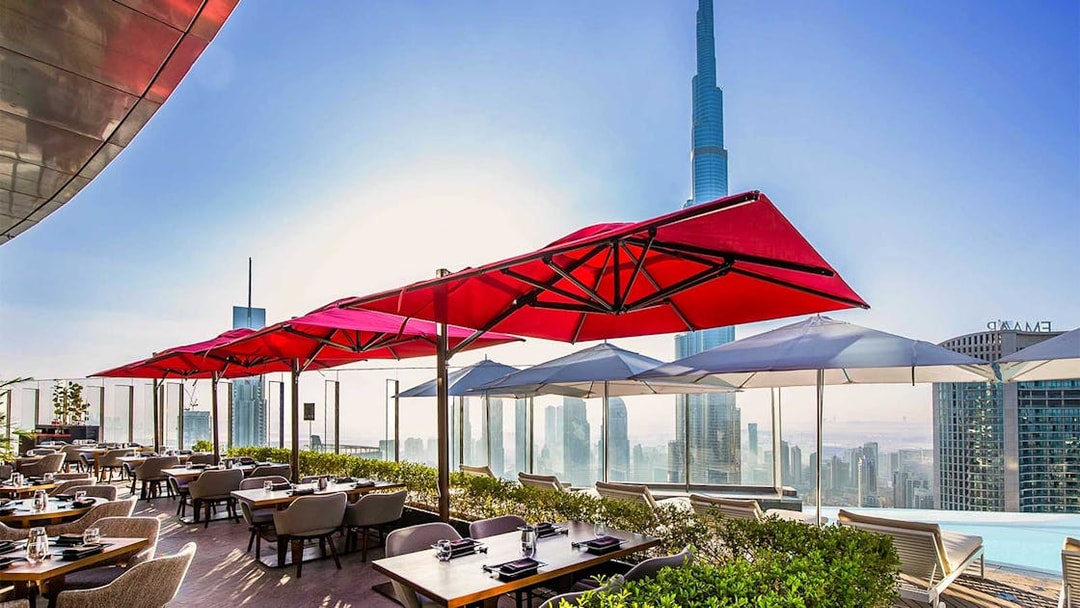 CÉ LA VI Dubai terrace dining with Burj Khalifa view.