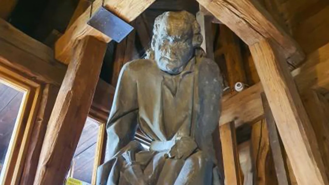 Statue inside Charles Bridge Tower, part of the mobile-guided tour in Prague.