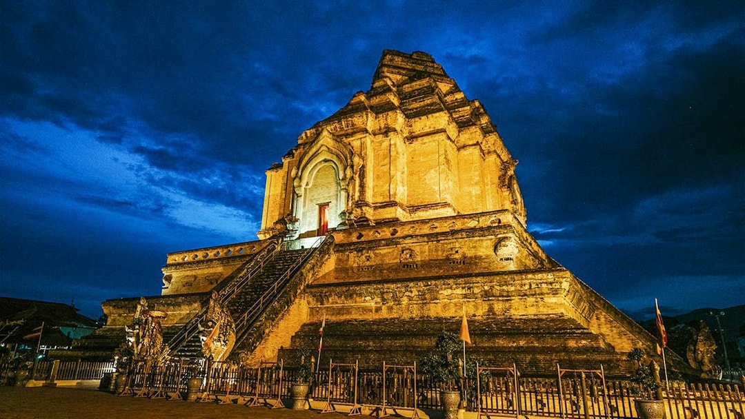 Wat Chedi Luang illuminated at night, Chiang Mai Night Bike Tour.