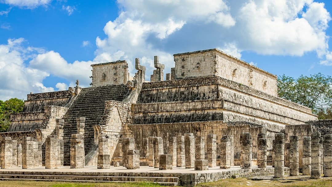 Temple of the Warriors with stone columns and steps in Chichen Itza, Mexico.