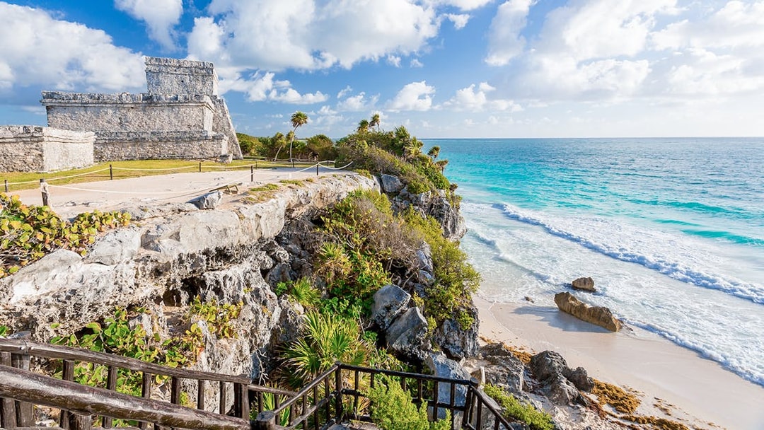 Tulum Wind God temple overlooking the Caribbean Sea in Mexico.