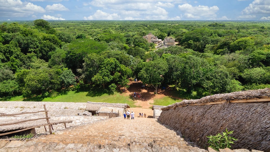 View from La Torre at Ek Balam Archaeological Site, overlooking Yucatan jungle and ruins.