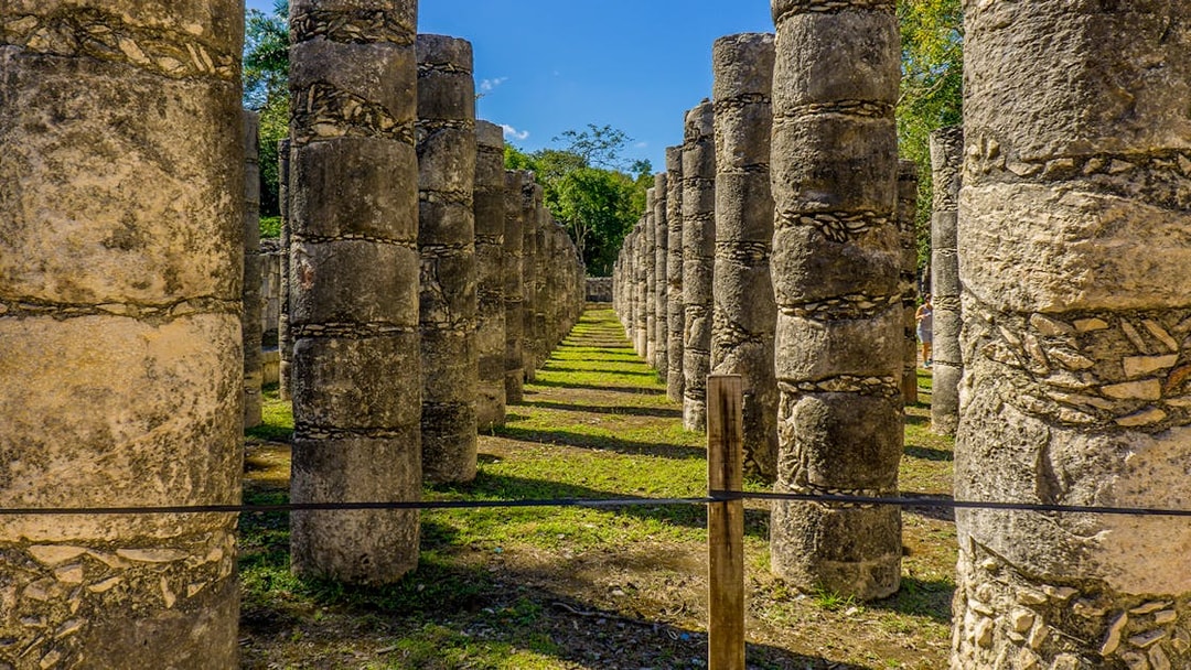 Row of stone columns at Chichen Itza ruins in Yucatan, Mexico.