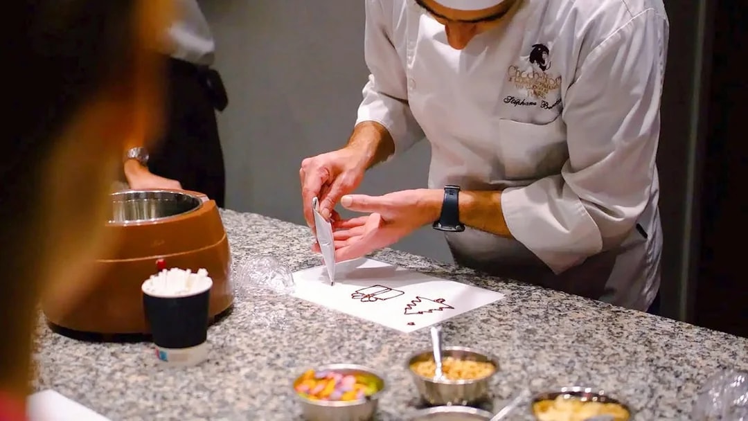 Chocolate preparation demonstration at Choco-Story Paris.