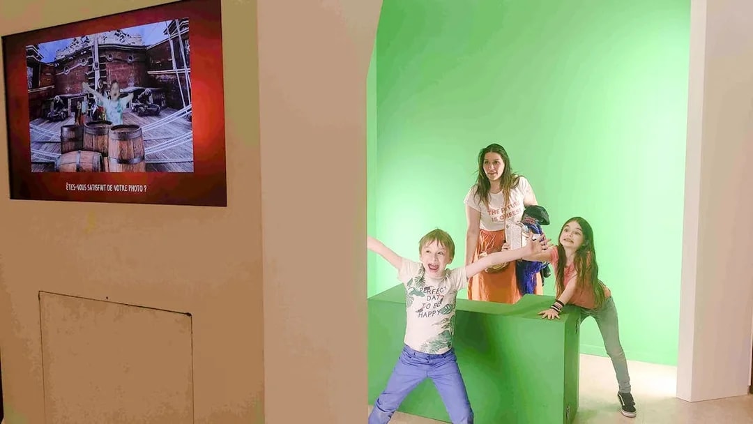Family enjoying interactive exhibit at Choco-Story Paris.