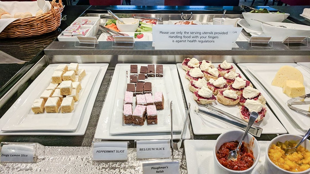 Assorted desserts and condiments at Plaza Premium Lounge buffet.
