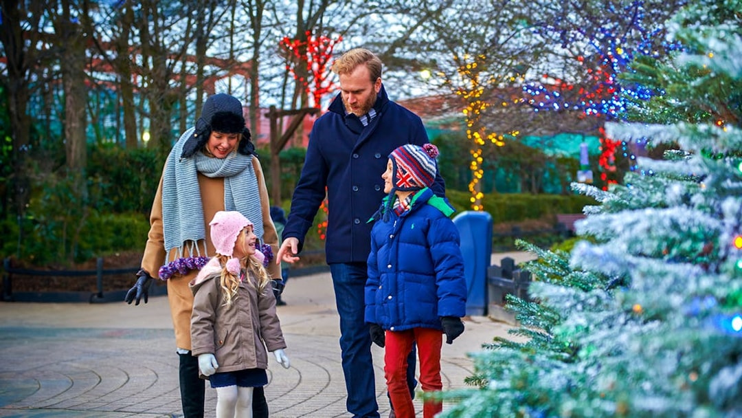 Family enjoying Christmas decorations at Legoland London.