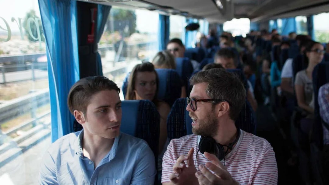 Passengers seated on a Terravision bus traveling between Ciampino Airport and Rome city center.