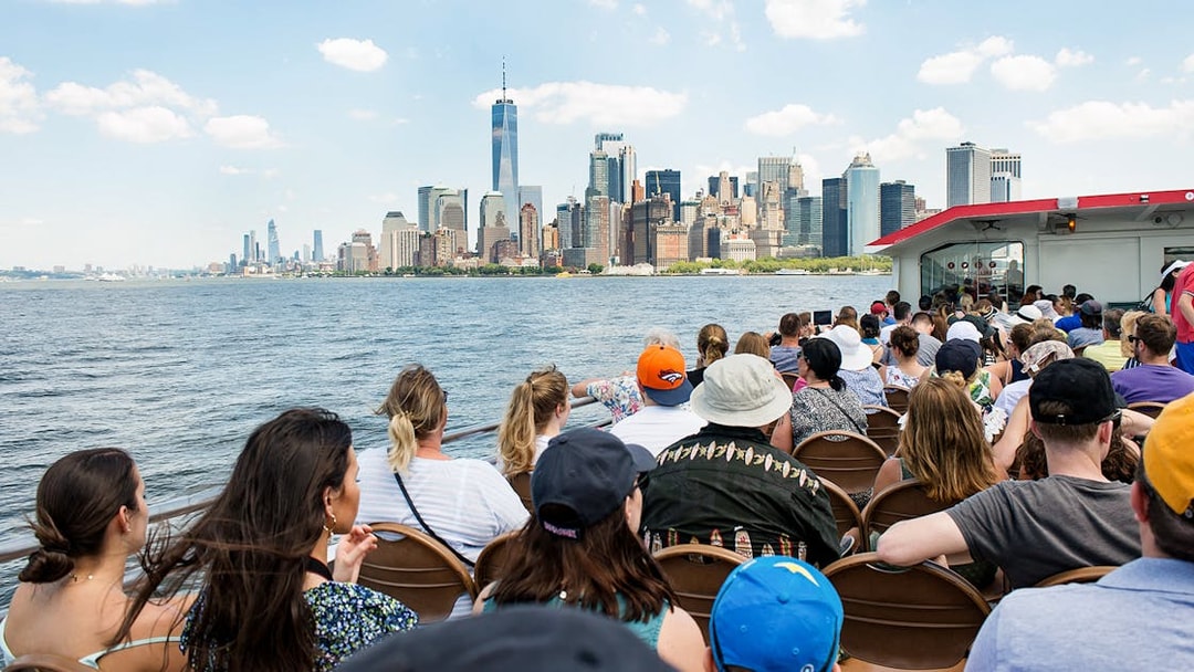 Guests on Liberty Super Express viewing New York City skyline.
